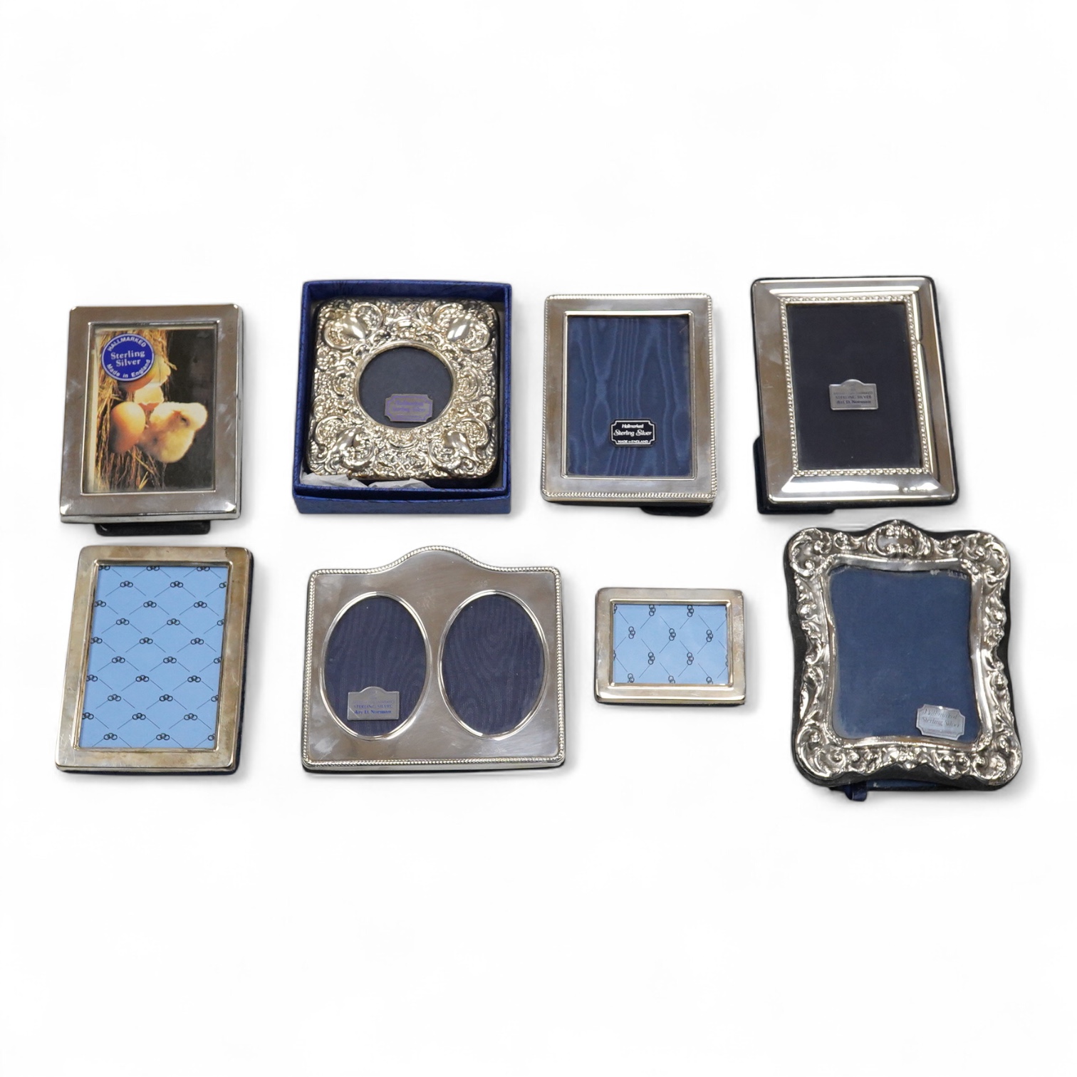 A collection of eight modern silver mounted photograph frames, including double, maker AN, width 11.2cm.